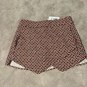 NWT size medium Aqua navy and orange patterned skort